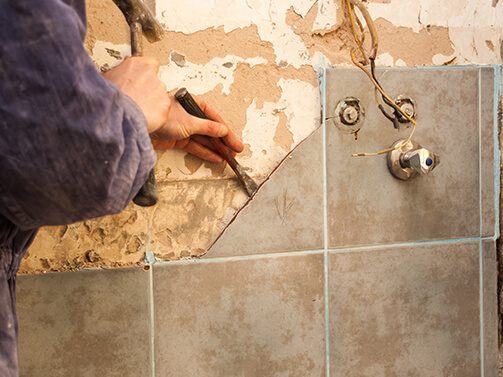 kitchen-bathroom-gut-out removing tile from bathroom wall
